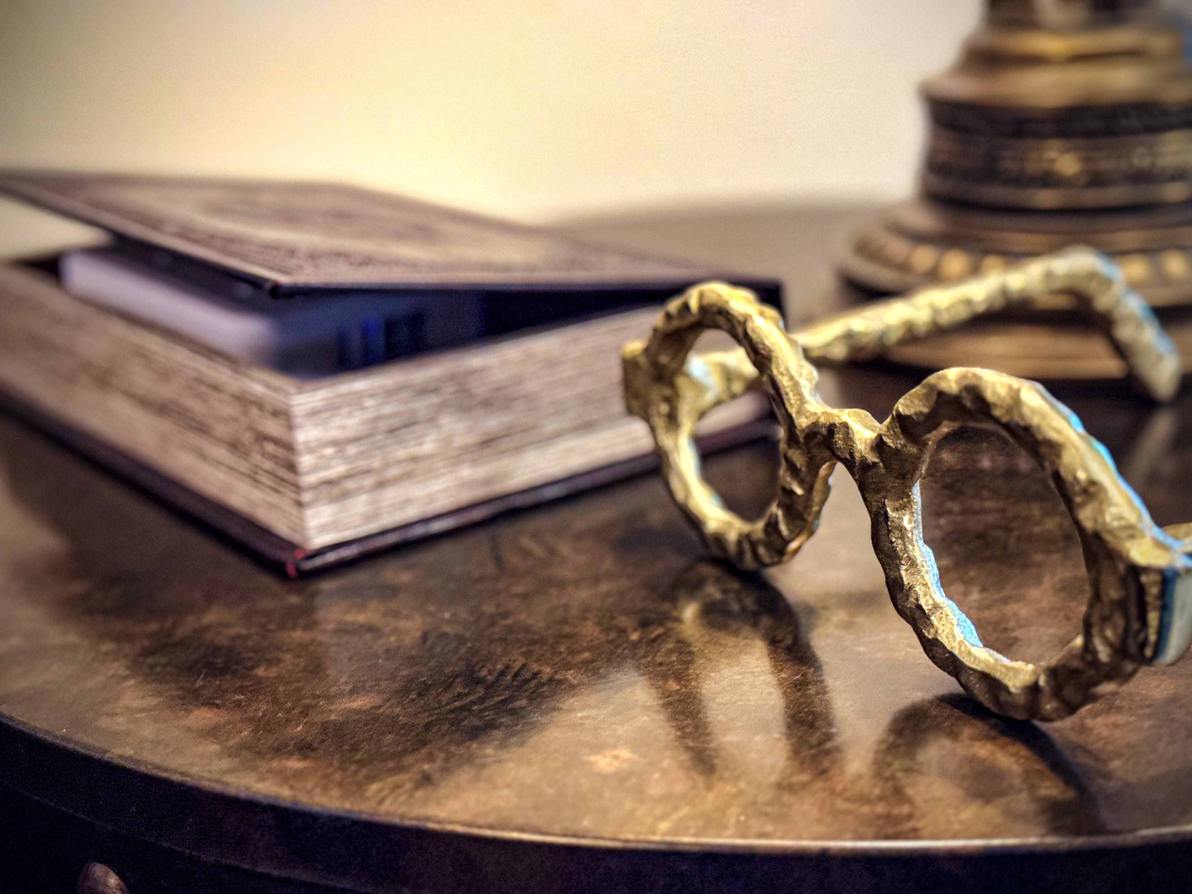 Harry's glasses and weathered spell book