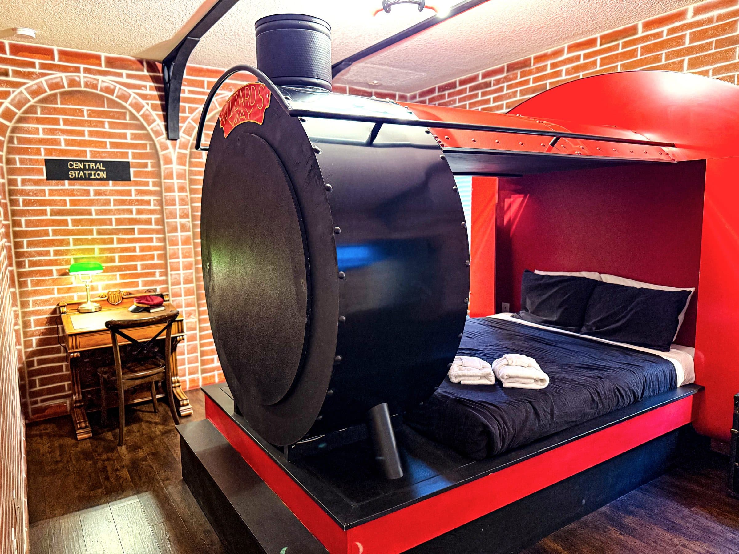 Climb aboard the locomotive bed inspired by Platform 9¾. One button — steam billows, horn bl
